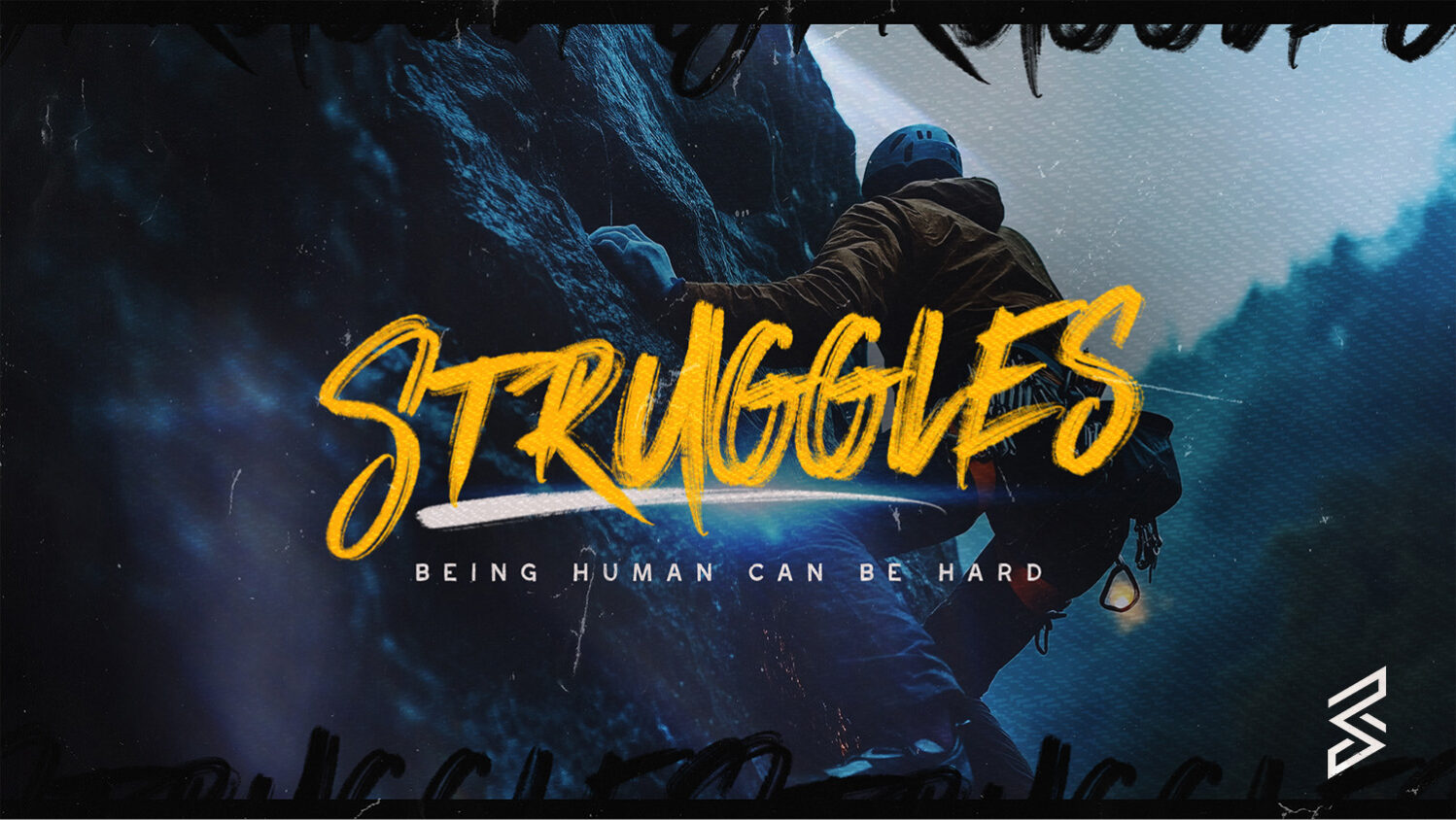 Climber struggles on a challenging rock face